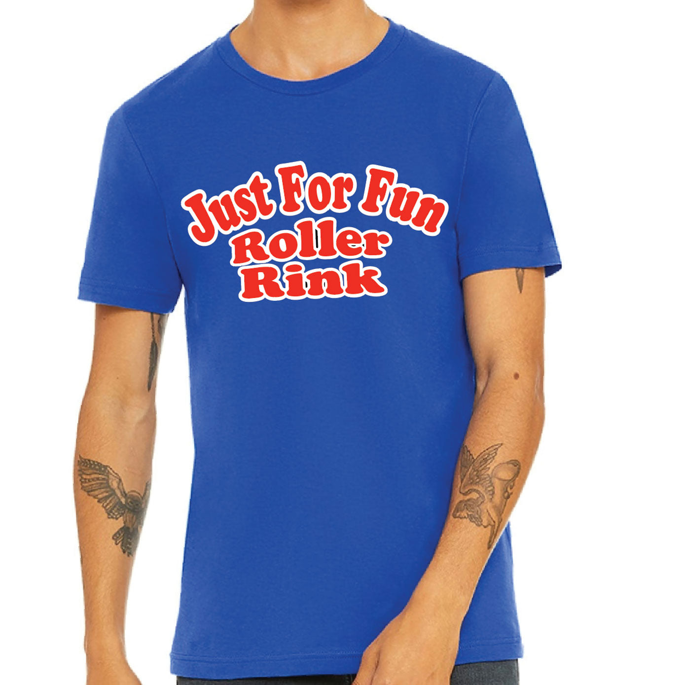 Person wearing a blue t-shirt with 'Just For Fun Roller Rink' text on a white background