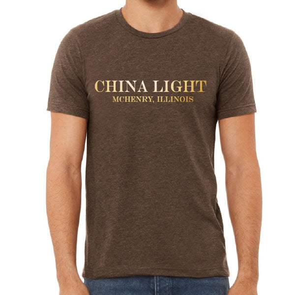 Brown t-shirt with 'China Light McHenry, Illinois' text on a white background
