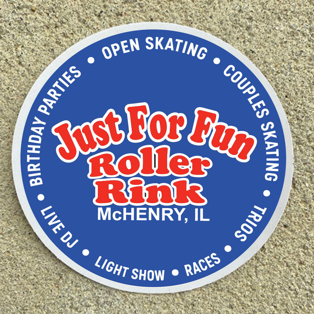 Round sign for 'Just For Fun Roller Rink' with text on a textured surface