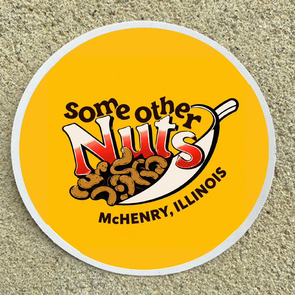 Round sticker with 'Some Other Nuts' logo and text on a textured surface